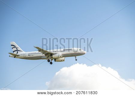 DUESSELDORF , GERMANY - OCTOBER 05 2017: Aegan Airline Airbus A320 landing at Dusseldorf Airport