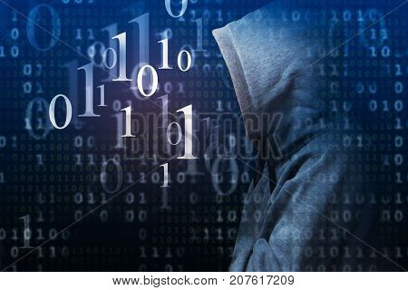 Side view of unrecognizable man in hoodie standing on abstract blue binary code digital hacker background. Safety concept. Double exposure