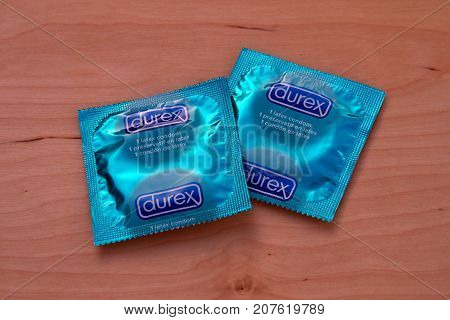 Almere, The Netherlands - October 6, 2017: Durex condoms against a wooden background.