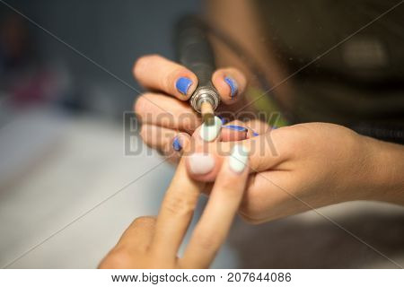 Hardware Manicure. Removal Of Old Gel Varnish In The Salon. Manicure Master Doing Beauty Procedure F