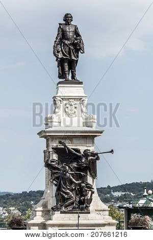 Statue of Samuel de Champlain against blue summer sky in the historic area founder of Quebec City, Canada