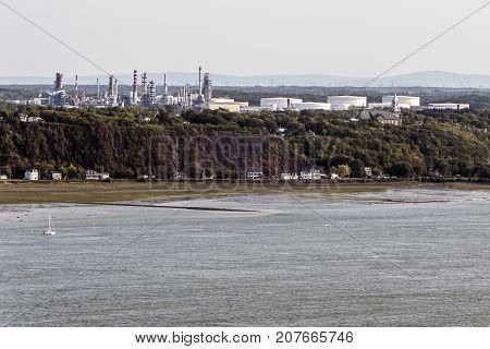 Cityscape or skyline of the Saint Lawrence river with Jean Gaulin Oil Refinery from plaines d'Abraham Quebec City Canada
