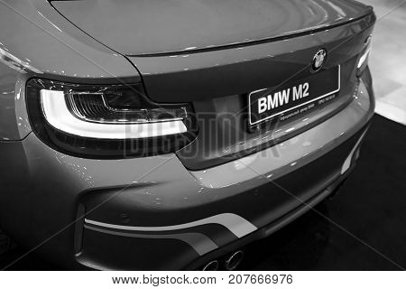Sankt-Petersburg Russia July 21 2017: Back view of a BMW M2 sports car. M Performance Edition. Car exterior details. Black and white. Photo Taken at Royal Auto Show July 21