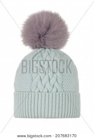 Luxury beautiful knitted woolen green female hat with fur ball pampone on white background