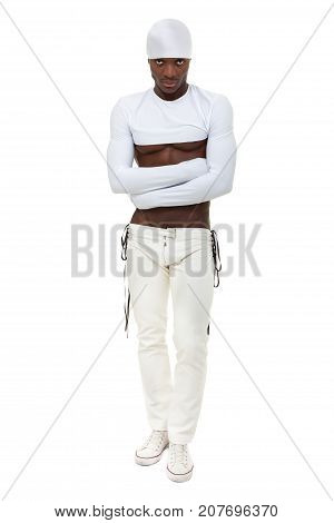 Muscular sexy man dancing, full length portrait isolated on white background.