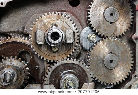 Old diesel engine and spare parts in the workshop.