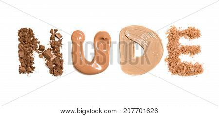 inscription nude from tonal bases of decorative cosmetics on white background. Beauty and makeup concept.