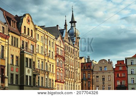 Facades of historic tenement houses on the market in Swidnica in Poland