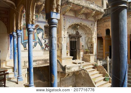 MANDAWA, INDIA - MARCH 31, 2007: Interior yard of the haveli in Mandawa, India. Snehi Ram Ladia haveli in Mandawa Rajasthan was built in mid 19th century.