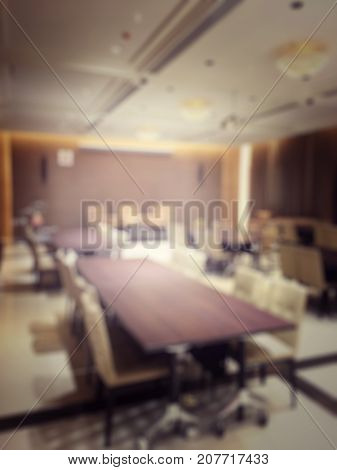 Blurred Image Of Empty Interior Of Conference Room, Meeting Room Prepare For Webinar. Blurry Nobody