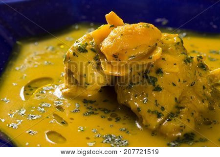Pequi Fruit With Chicken Over A Wooden Table. Frango Com Pequi.