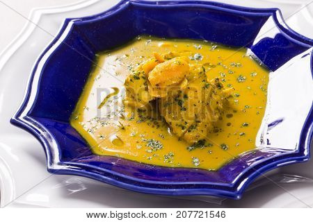 Pequi Fruit With Chicken Over A Wooden Table. Frango Com Pequi.