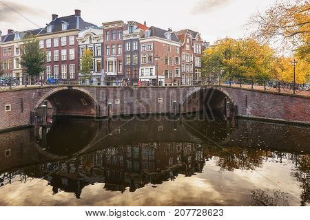 Amsterdam Netherlands - October 30 2016: Crossing Herengracht Reguliersgracht in the old town of Amsterdam