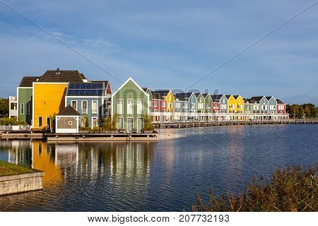 In the town of Houten these beautifully painted houses are on the water