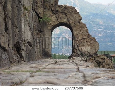 Ancient Roman Road Arch In Donnas
