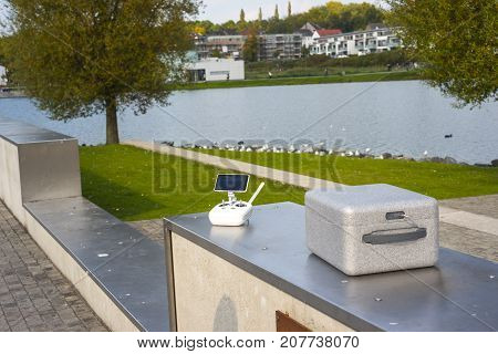 Drone equipment near a lake and the drone box delivered package