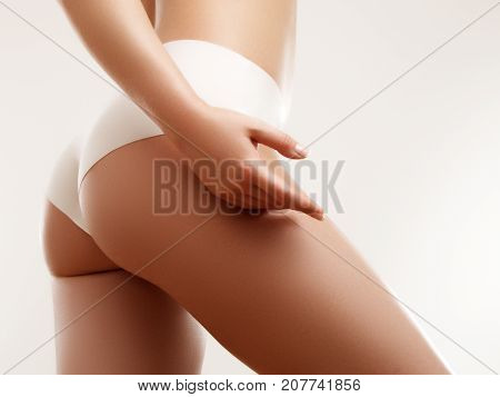 Beautiful Slim Woman's Body. Perfect Slim Toned Young Body Of The Girl. Fitness Or Plastic Surgery A