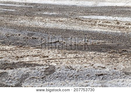 The Marks Of A Car Left On The Paved Road. The Photo Was Taken Close-up, Small Depth Of Field. The W