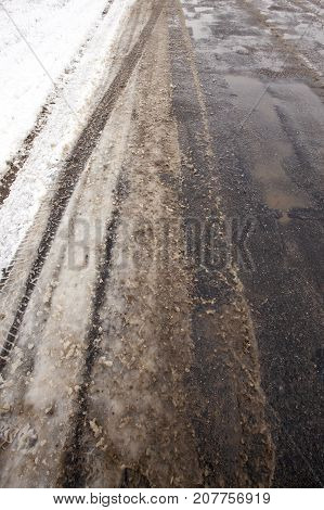 Snow-covered Road In The Winter Season. Close-up Photo