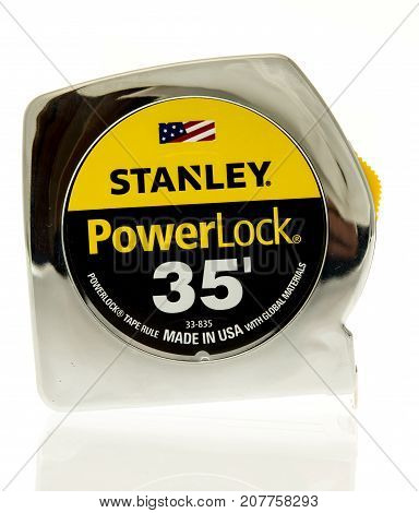 Winneconne WI - 4 October 2017: A Stanley chrome 35 foot tape measure on an isolated background.