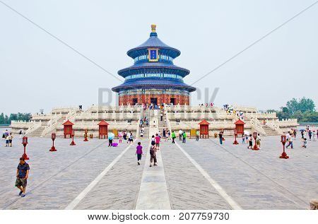 Bejing July 2011- In July many visitor come at the Temple of Heaven: an Imperial Sacrificial Altar where the Chinese emperor organized human sacrifices to invoke wind rain and peace in his kingdom