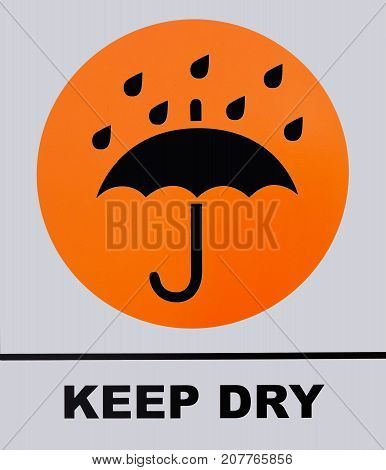 Photo of Keep Dry sign isolated on white background. This photo was taken from the sign board.