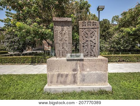 Echmiadzin Armenia. Ancient khachkars brought to the monastery from all over Armenia. the therteenth century from Jughi (inscription on the plate).