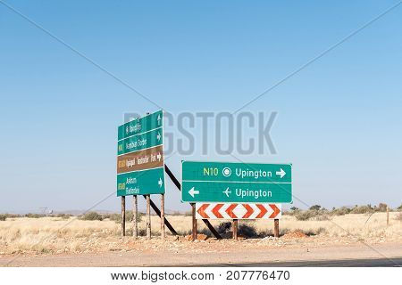 Directional sign boards at the junction between the N10 and R360 roads at Upington a town in the Northern Cape Province