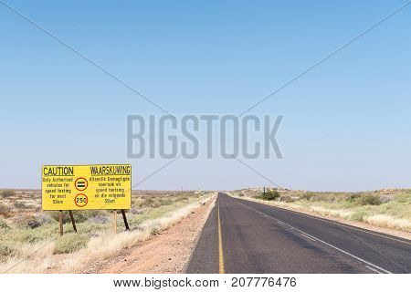 A speed limit warning sign on the R360-road between Askham and Upington in the Northern Cape Province of South Africa