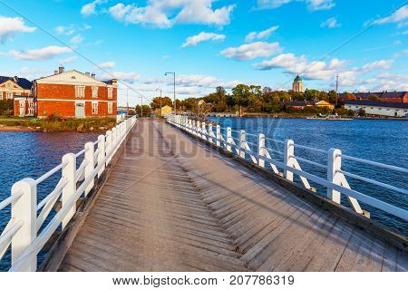 Scenic summer view of the wooden bridge on Suomenlinna Island, Helsinki, Finland