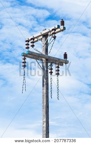Closeup to Concrete Electrical Power Transmission Pole [without cable]