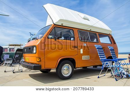 Scheveningen The Hague the Netherlands - 21 May 2017: VW kombi van at the beach
