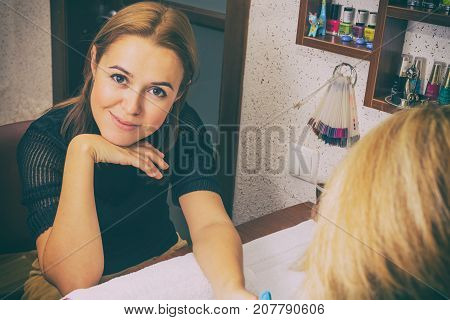 girl doing a manicure at the spa.