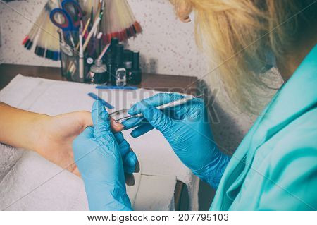 For A Girl Doing A Manicure On The Photo.