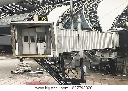 The Tunnel of the jet bridge connected to the aircraft for loading people.