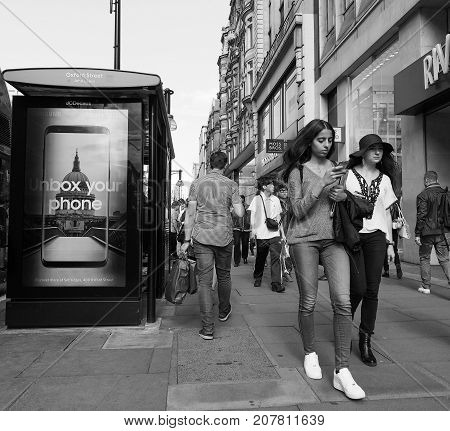 People In Oxford Street In London Black And White