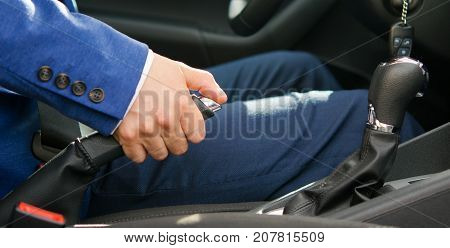 putting the car on a handbrake the driver