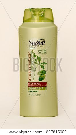 New York September 17 2017: Bottle of Suave shampoo stands against white background.