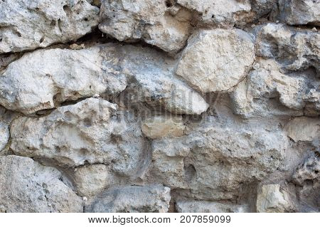 The background with the old stone wall