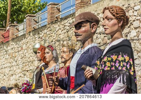 Alcover, Spain, October 2017:Giants and large heads are a folkloric tradition of catalonia and parts of Spain.They've a papier mache head and bodies are covered in clothing matching the costume's theme