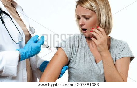 Vaccination. Doctor With Syringe Making Vaccination To Patient