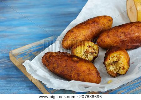 Unnakaya / Plantain fritters with coconut filling - Ramadan food of Kerala Malabar