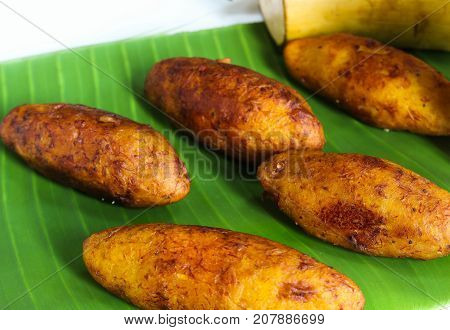 Unnakaya / Plantain fritters with coconut filling - Ramadan food of Kerala Malabar