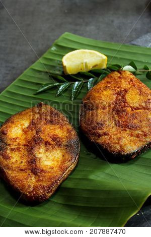 King Fish fry on banana leaf selective focus