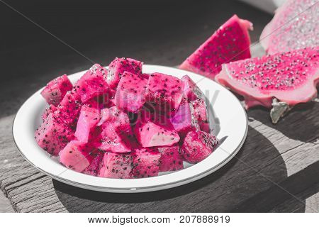 Slices Of Red Dragon Fruit On Plate