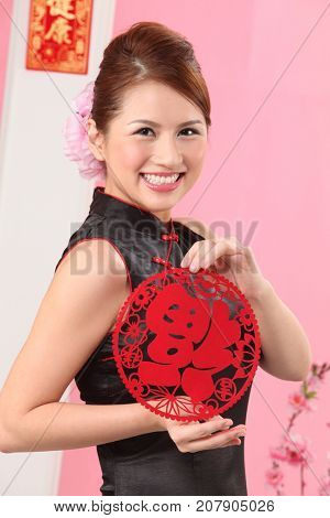 Young woman celebrating Chinese New Year