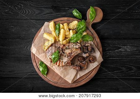 Delicious grilled steak frites on waxed paper