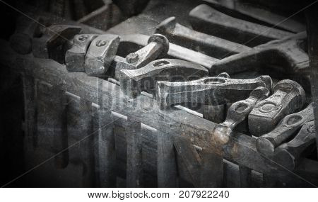 Collection Of Vintage Woodworking Tools On A Rough Workbench