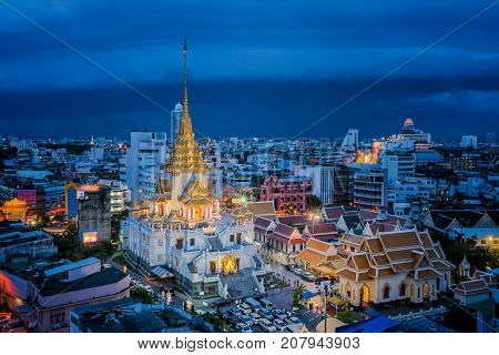 Day to night short of Wat Trimit Temple in china town Bangkok city Bangkok Thailand