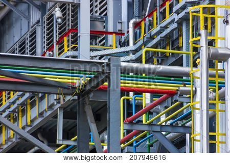 The different colored pipes in the installation of a petrochemical plant